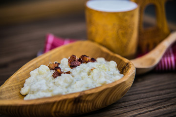 Slovak traditional food - potato gnocchi dumplings with sheep cheese and bacon.