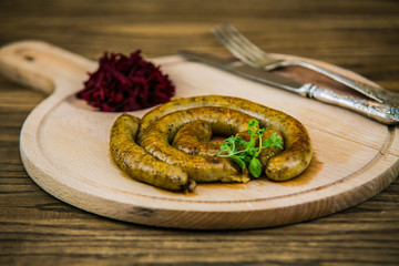 Slovak traditional food - white pudding on a wooden board.