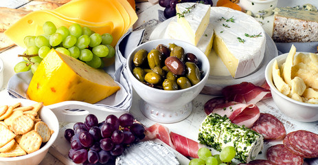 Charcuterie assortment, cheeses, olives and fruits