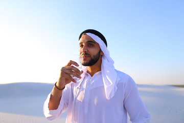 Breath of freshness of male Muslim in middle of dry climate of s