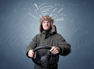 Man holding steering wheel