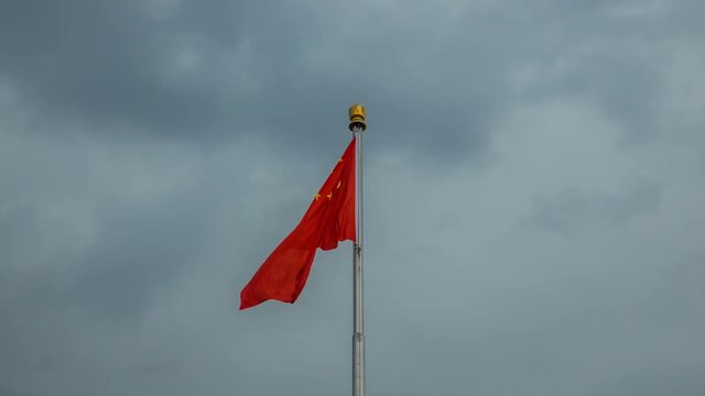 Time lapse of Chinese red flag flutters in wind