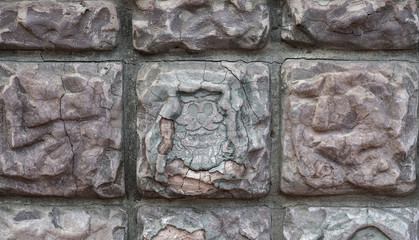 Vintage brick-wall with an owl