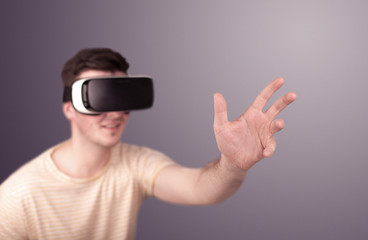 Naklejka premium Man wearing virtual reality goggles