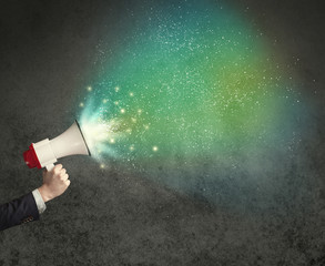 Hand holding megaphone