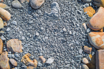 Stone texture. Natural background of small gravel and rock frame