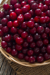 cherries on wooden surface