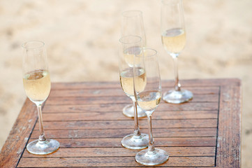 glass white wine at the beach