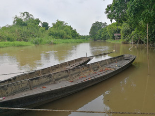 Old boat in the river thai