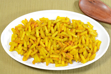 Crispy potato fry in a white plate