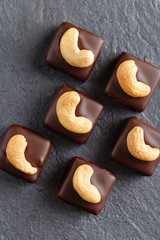 Handmade chocolate bonbons with cashew