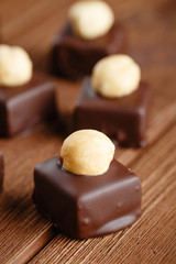 Handmade chocolate bonbons with hazelnut