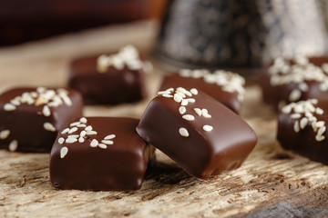 Handmade chocolate candies with sesame seeds