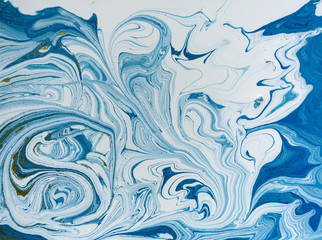 Marbled blue and golden abstract background. Liquid marble pattern