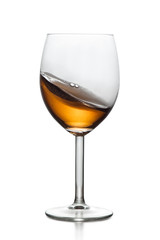 Splashing drink in glass