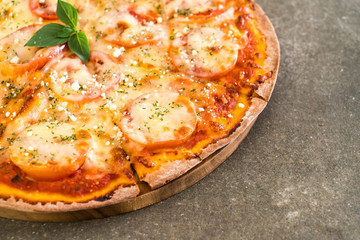 tomatoes pizza on table