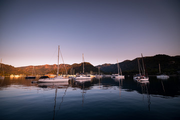 Yachts in bay with morning light