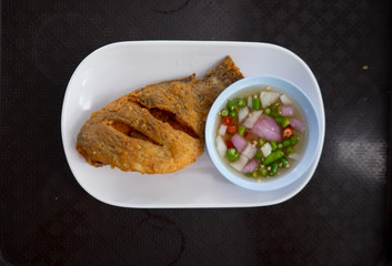 Thai food Deep fried little Tilapia fish call Pla Nil Tod