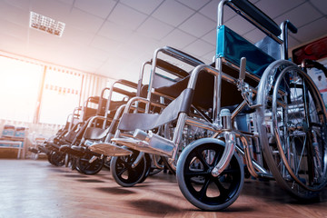 Fototapeta na wymiar Empty wheelchairs at the hospital.