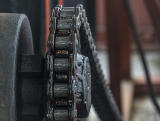 The old and vintage chain belt of a engine
