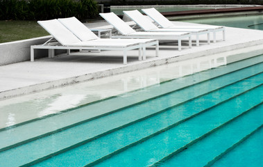 Swimming pool and white pool bed