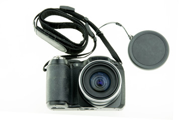top view of camera on white background.