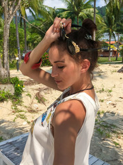 Beautiful, slender girl in bikini on the beach