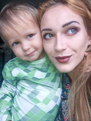 Happy mother and baby self