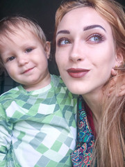 Happy mother and baby self