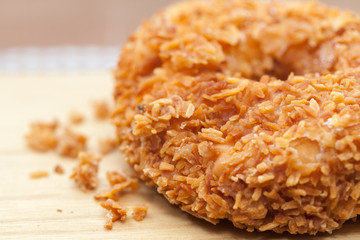 close up of Toasted Coconut doughnut
