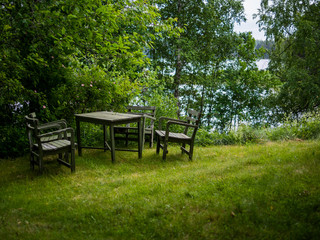 Table and chairs in nature