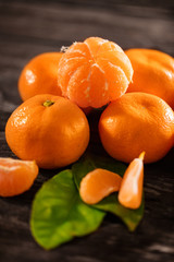 ripe mandarines, peeled tangerine and tangerine slices.