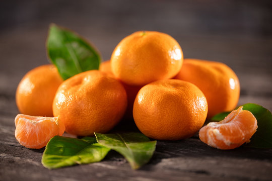 mandarines, peeled tangerine and tangerine slices.