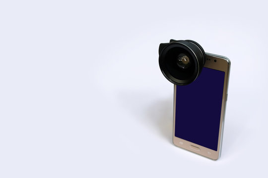 Clip lens with mobile phones in white background.