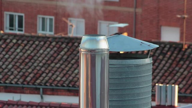 Detalle de Chimeneas de Edificios en los Tejados
