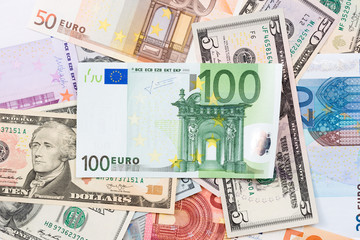 A big amount of euro and dollar banknotes.