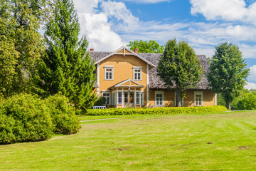 Fototapeta na wymiar Old village house in Turaida Museum Reserve, Latvia