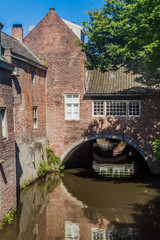 Fototapeta na wymiar Old houses and a canal in Den Bosch, Netherlands
