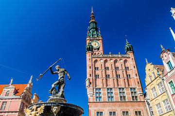 Neptune's fountain and the Town hall in Gdansk, Poland © Matyas Rehak
