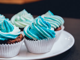 Chocolate caramel cupcake with nuts and butterscotch syrup