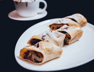 Homemade apple pies decorated with chocolate