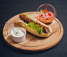 Grilled chicken seekh kebab with fresh bun and cheese.