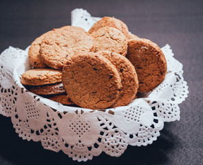 French cookies with jam on the white plate.