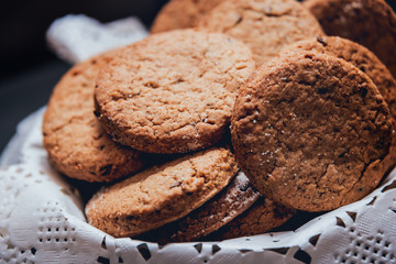 French cookies with jam on the white plate.