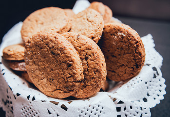 French cookies with jam on the white plate.