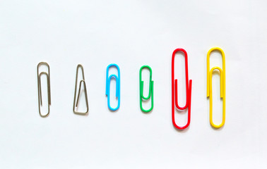 Colorful paper clip on white background.