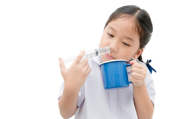 asian student girl flushing her nose with syringe and saline isolated
