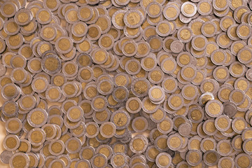 a lot of mexican pesos coins background