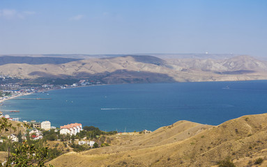 Fototapeta na wymiar View of the urban-type settlement on the coast of the Black sea.