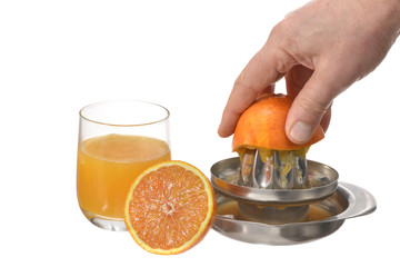 Making a fresh orange juice.